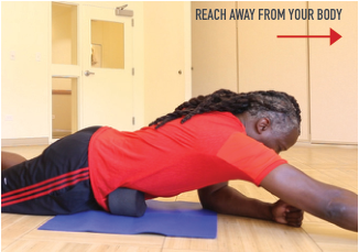 Reach the same-side arm in the Body Wedge manual
